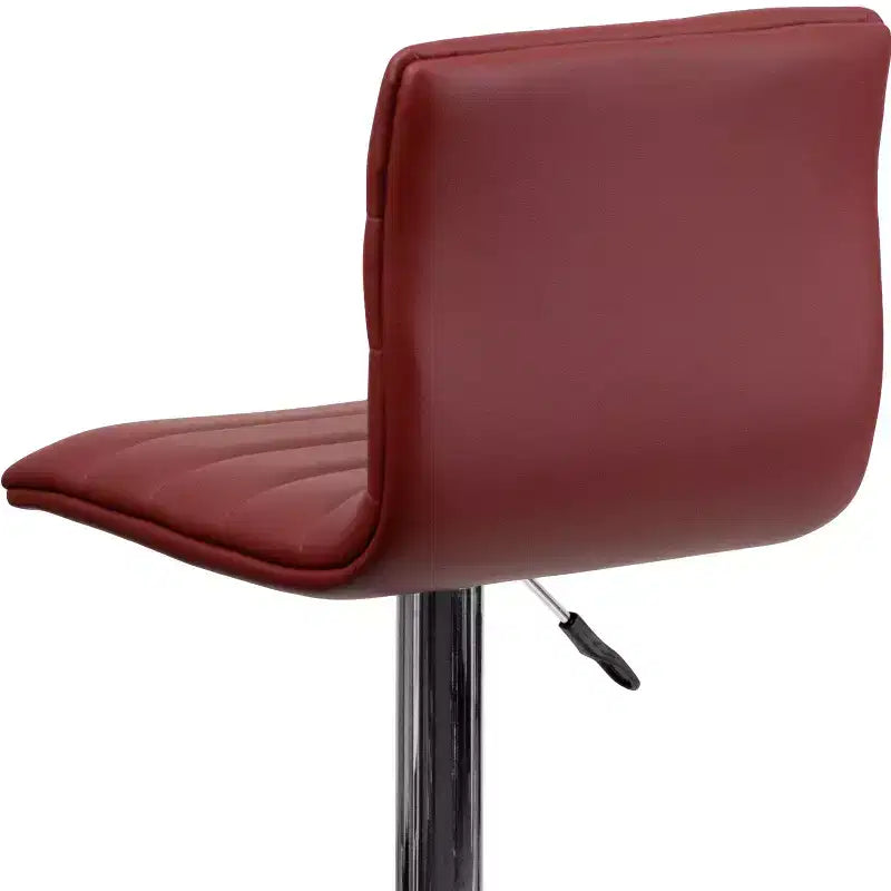 Tabouret de bar moderne en velours capitonné, réglable en hauteur, avec dossier mi-haut et repose-pieds.