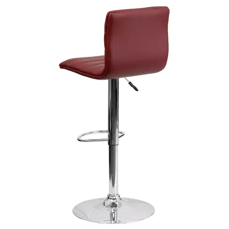 Tabouret de bar moderne en velours capitonné, réglable en hauteur, avec dossier mi-haut et repose-pieds.
