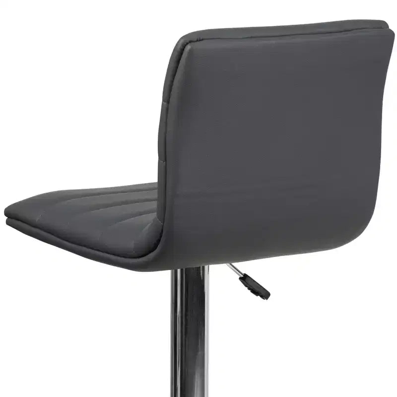 Tabouret de bar moderne en velours capitonné, réglable en hauteur, avec dossier mi-haut et repose-pieds.